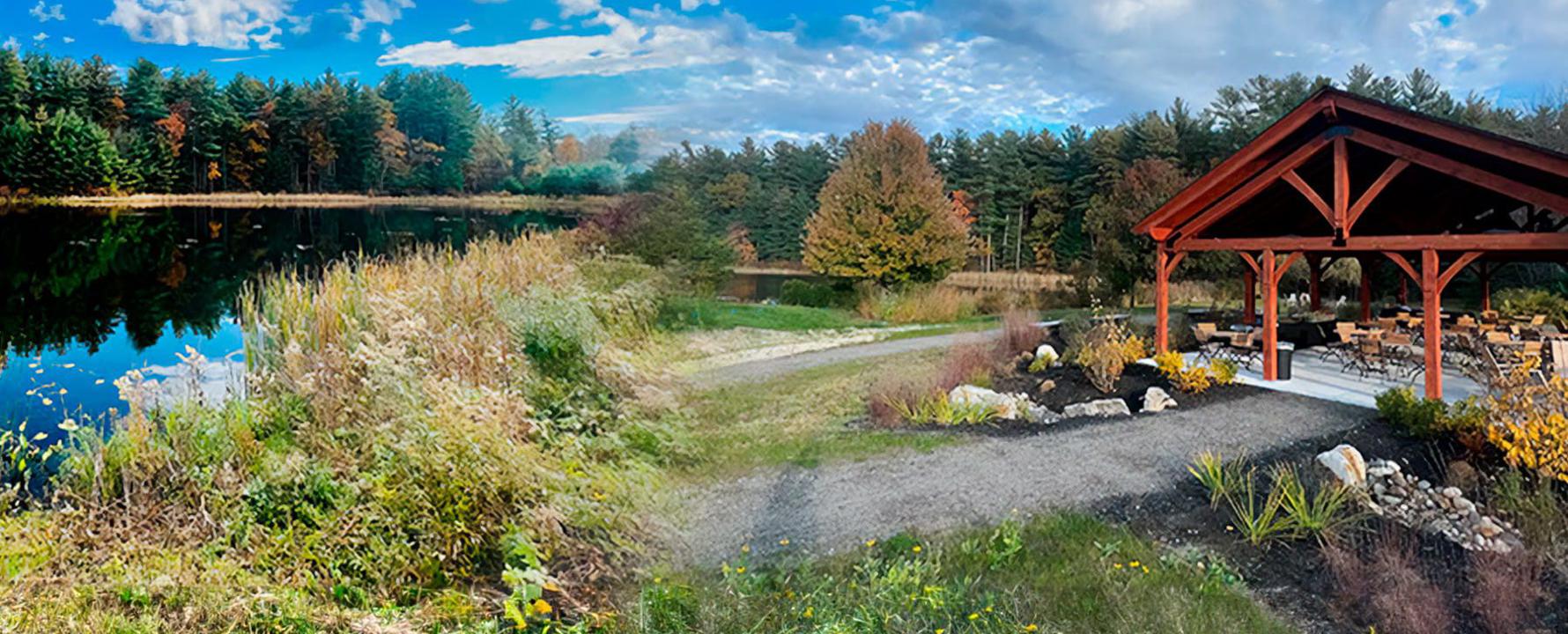 a picnic area next to a lake